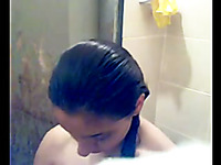 Cute amateur Pakistani girl showering on home video alone