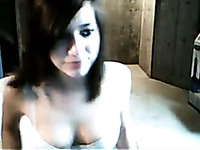 Appealing brunette friend flashes her titties on webcam