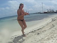 Naughty Christine - Applying Lotion on a Topless Beach