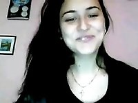 A hot collage girl fingering her cunt on webcam.