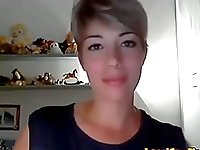 Very beautiful short hair girl pleasures her pussy