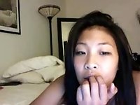 Asian doll flicking her bean