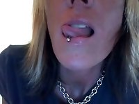 Blonde busty hottie teased me with her pierced tongue
