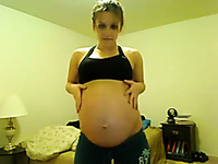 Beautiful pregnant GF stripping seductively on camera