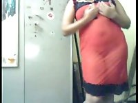 Horny Indian webcam model shows off her tits in transparent dress