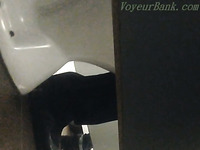 Redhead beautiful woman in the public restroom spied and filmed on cam