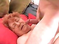 Big fat granny get a facial by a young dick