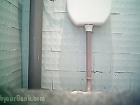 Pale skin brunette sweetheart in the toilet room caught on voyeur video
