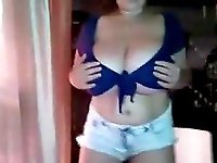 Extremely busty lady showing off all of her sexy curves