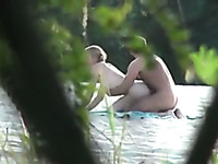 I peeked on amateur couple fucking right on the beach outdoors