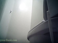 Amateur white young chick in the public restroom filmed from behind