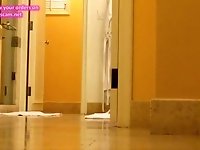 unaware MILF caught on hotel bathroom hidden cam