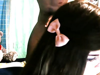 Webcam cute brunette long haired teen was giving a BJ to her boyfriend
