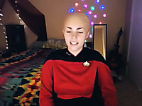 Female version of Captain Picard shows off her sexy boobies while stripping