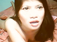 Beautiful and young Asian bimbo masturbates on webcam