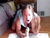 Webcam slut plays with big dildo and reaches intense orgasm.