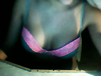Attractive amateur girl showing her titties on webcam
