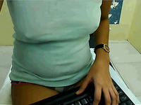 Asian sweet and cute brunette cam girl uses black dildo for her anus