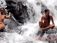 Two naked babes having fun at the waterfall and hot doggy sex view from above