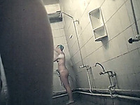 A lovely slender ass of a stranger white girl filmed closeup on hidden cam in the shower