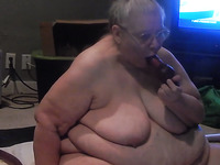 Extremely chubby disgusting old lady sucked her dildo on webcam
