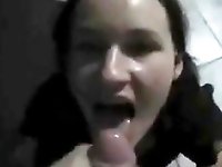Horny brunette  enjoys to suck and lick the massive dick of her man.