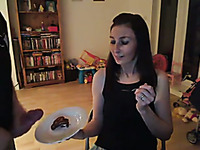 Amateur webcam brunette from Britain eats chocolate cake with cum
