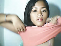 Cute amateur Asian teen webcam babe flashes her petite boobs