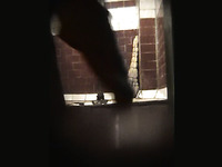 A hidden voyeur camera films stranger white girl pissing in the toilet room