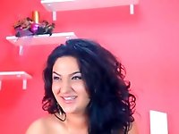 Webcam Latina MILF plays with her melons