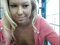 Charming blonde babe flashes her tits in public library