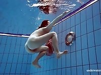 One more amateur underwater solo show performed by lovely naked gal